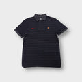 Nike Manchester United polo shirt in black and grey stripes with red swoosh logo