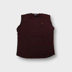Nike vest in brown featuring a small embroidered yellow swoosh logo on the chest