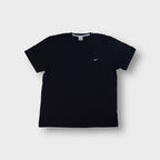 Black Nike T-Shirt with a small white embroidered swoosh on the chest