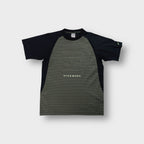 Nike Shox T-Shirt in black and olive with a geometric chest print and raglan sleeves