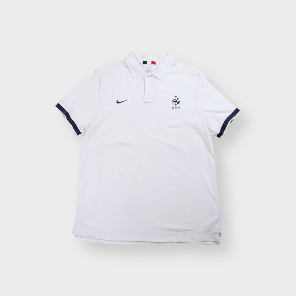 Nike white France polo shirt with embroidered FFF rooster logo and navy cuffs