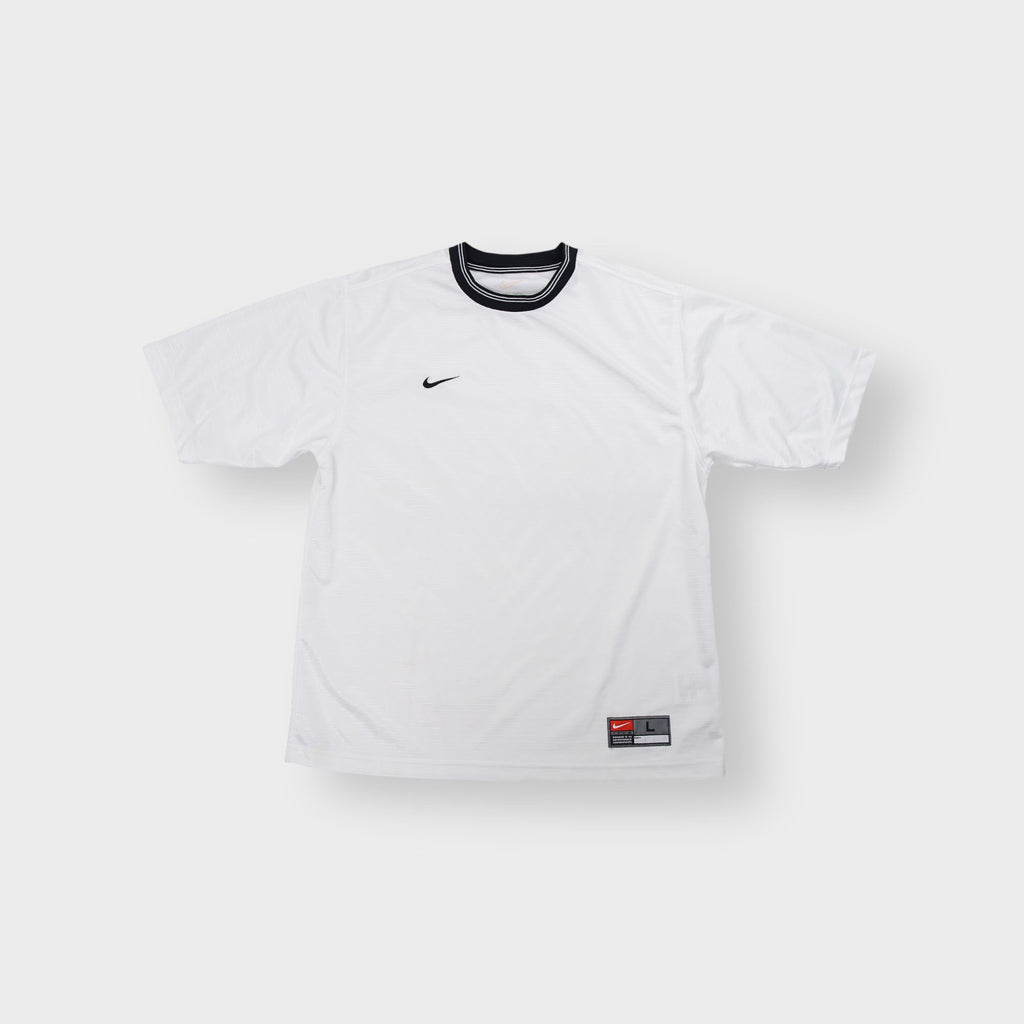 Nike jersey in white featuring a black striped crew neck collar and embroidered chest logo