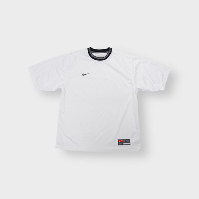 Nike jersey in white featuring a black striped crew neck collar and embroidered chest logo