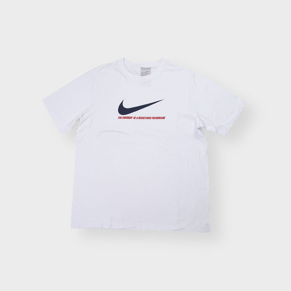 Nike white crew-neck T-Shirt with a navy swoosh logo and red printed graphic text