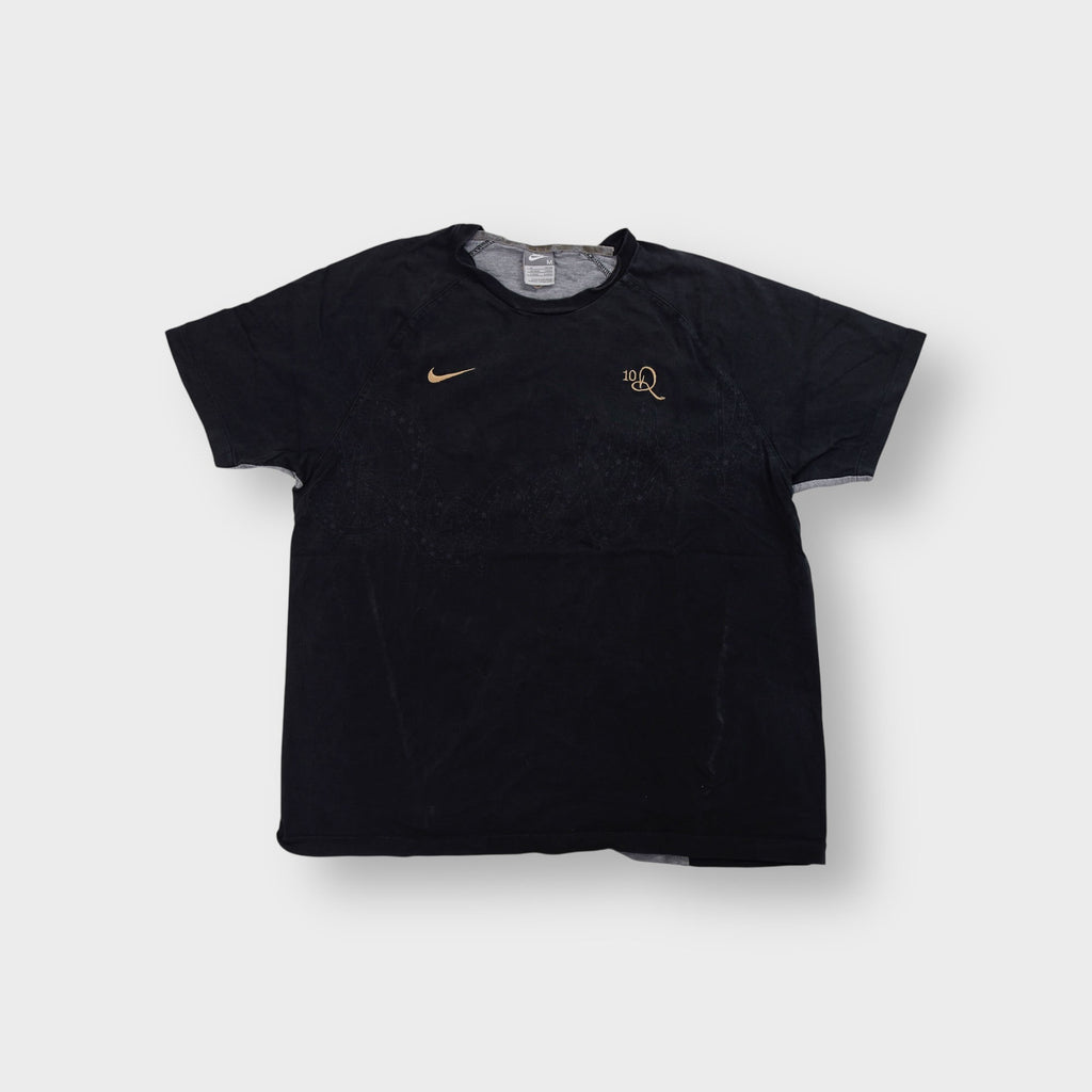 Nike T-Shirt in black featuring a gold embroidered swoosh and 10R logo on the chest