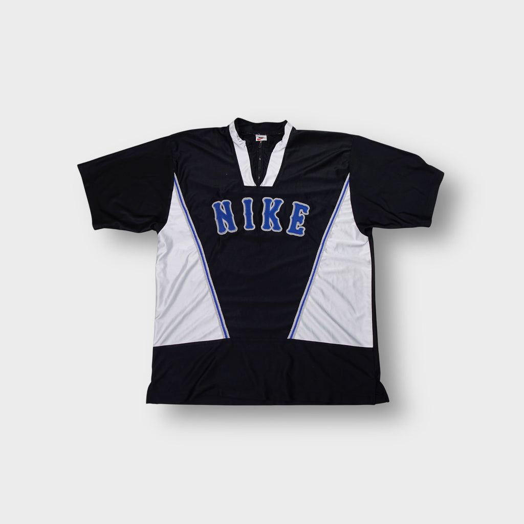 Nike warm up jersey in black and white with blue embroidered chest lettering