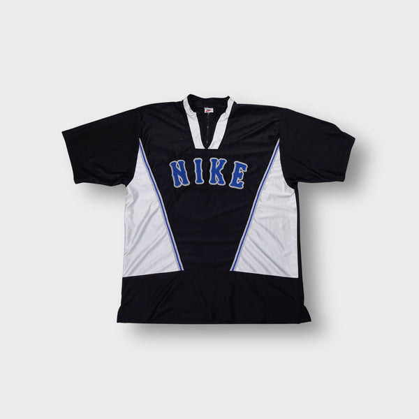 Nike warm up jersey in black and white with blue embroidered chest lettering