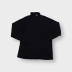 Nike turtleneck sweater in black with embroidered white Swoosh logo on collar