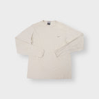 Nike cream long sleeve sweater with small silver embroidered swoosh logo