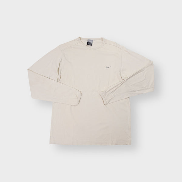Nike cream long sleeve sweater with small silver embroidered swoosh logo