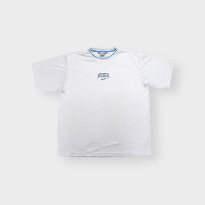 Nike T-Shirt in white featuring blue embroidered central text and swoosh chest logo.