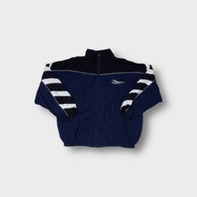 Load image into Gallery viewer, Reebok track jacket in navy blue with diagonal white and black sleeve stripes