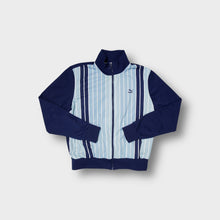 Load image into Gallery viewer, Puma track jacket in navy blue with light blue vertical striped front panel.