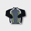Adidas track jacket in grey and black with yellow three-stripe chest embroidery.