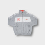 Adidas Originals jacket in grey and white featuring a 40th anniversary Trefoil print.