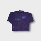 Athlet vintage 90s zip jacket in purple and teal with an embroidered chest patch.
