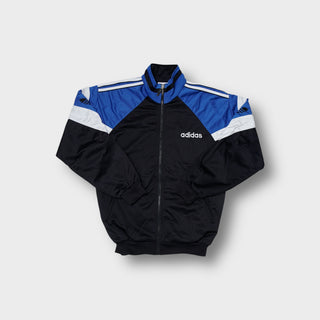 Adidas tracksuit jacket in black, blue, and white with embroidered Trefoil sleeve detail