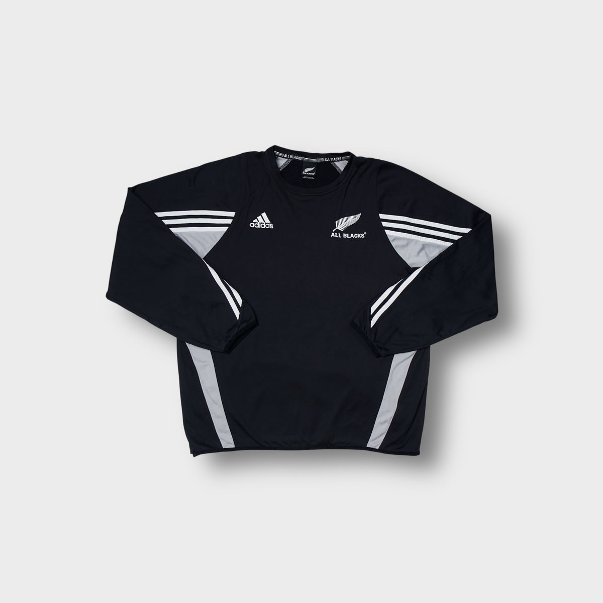 Adidas All Blacks black sweater featuring embroidered silver fern chest logo