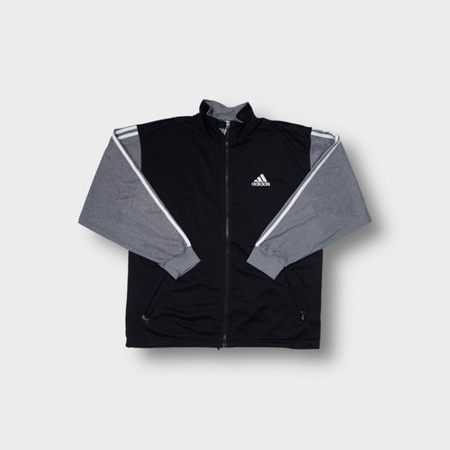 Adidas track jacket in black and grey with small embroidered chest logo and zip front