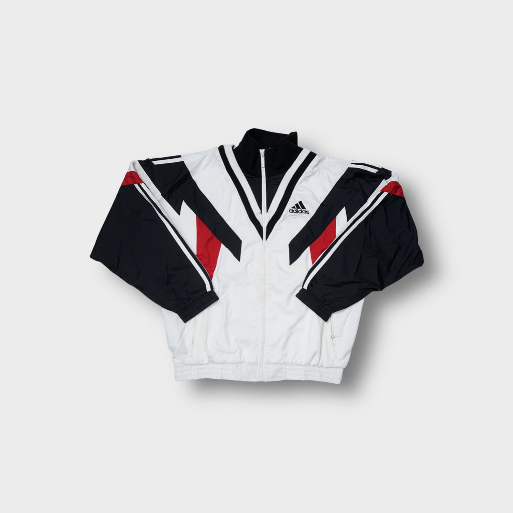 Adidas track jacket in white, black, and red with geometric panelling