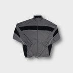 Asics track jacket in gray and black featuring white piping and chest logo patch