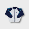 Adidas track jacket in white and navy with blue stripe details on the sleeves.