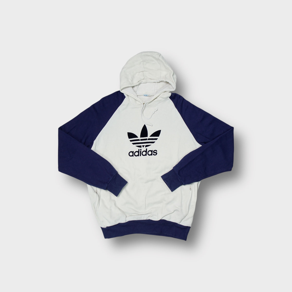 Adidas 90s hoodie in white and navy featuring a large printed trefoil front logo.