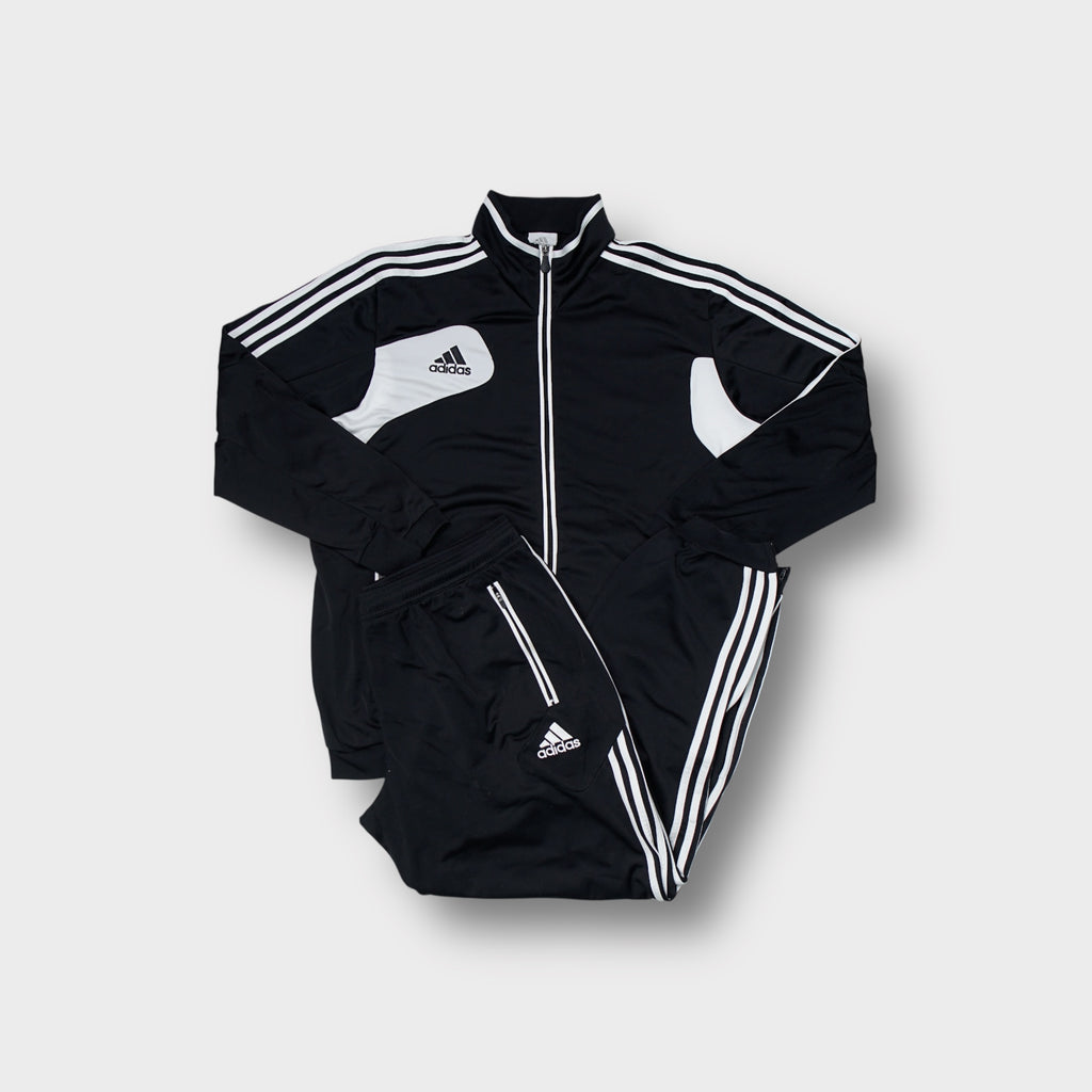 Adidas tracksuit set in black and white featuring contrast panel details