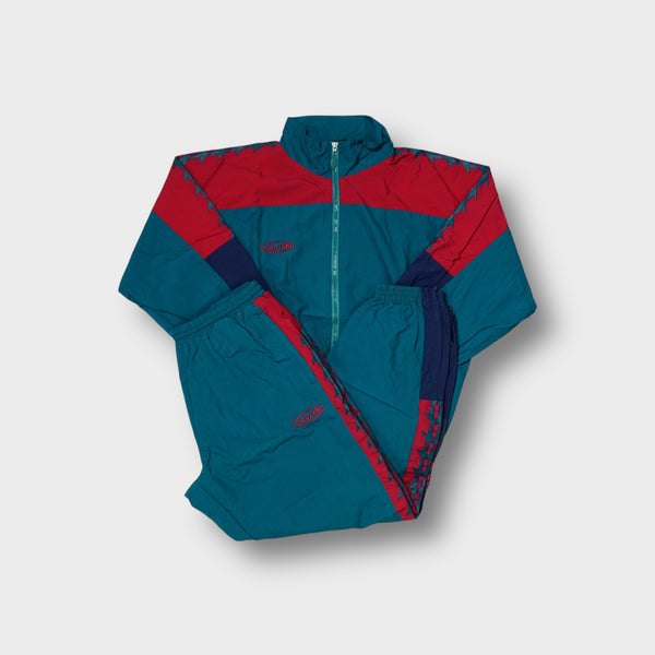 Reusch tracksuit in red and green with geometric sleeve side pattern