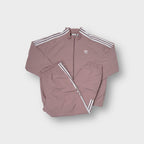 Adidas tracksuit in mauve with white three-stripe detailing and trefoil logo