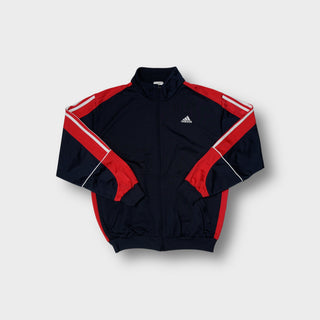 Adidas track jacket in navy blue with red panels and white sleeve piping