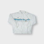 Adidas white track jacket with a blue and yellow wavy graphic print across chest