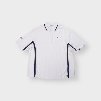 Lacoste Sport white polo shirt with navy blue side piping and embroidered logo