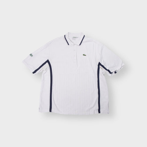 Lacoste Sport white polo shirt with navy blue side piping and embroidered logo