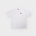 Tommy Hilfiger polo shirt in white textured waffle knit with embroidered chest logo patch