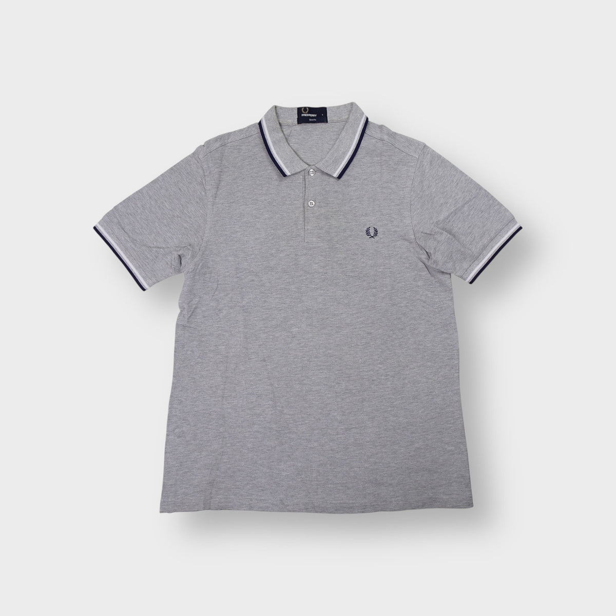 Fred Perry grey polo shirt with twin tipped collar and embroidered logo on chest