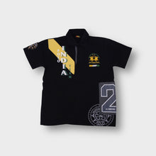 Load image into Gallery viewer, La Martina polo shirt in black with a yellow Polo India Team chest graphic patch.