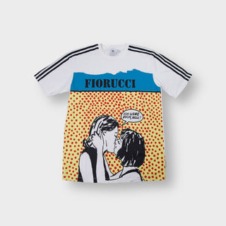Adidas white T-Shirt featuring a pop-art kissing couple graphic with three stripes