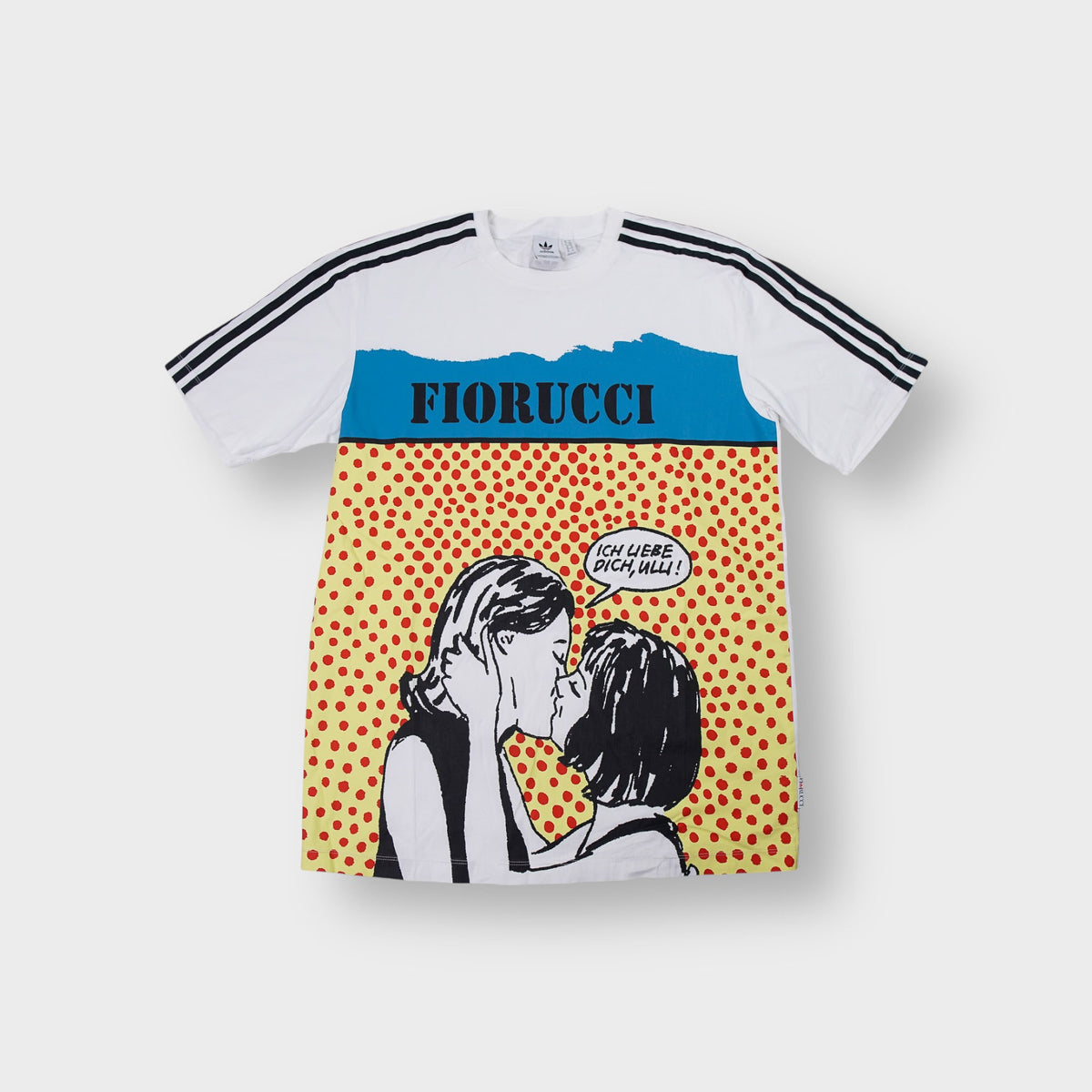 Adidas white T-Shirt featuring a pop-art kissing couple graphic with three stripes