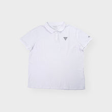 Load image into Gallery viewer, Guess polo shirt in white featuring an embroidered triangle logo on the chest