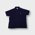 Lacoste polo shirt in navy blue featuring an embroidered green crocodile chest logo