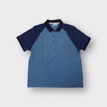 Load image into Gallery viewer, Lacoste blue short sleeve polo shirt with navy raglan sleeves and crocodile patch