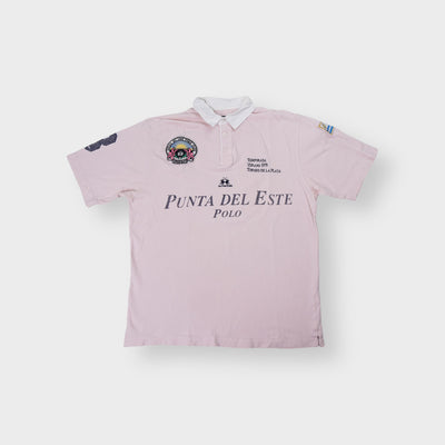 La Martina polo shirt in pink with Punta Del Este Polo chest embroidery.