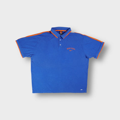 Nike polo shirt in blue featuring orange Boise State embroidery and collar trim.