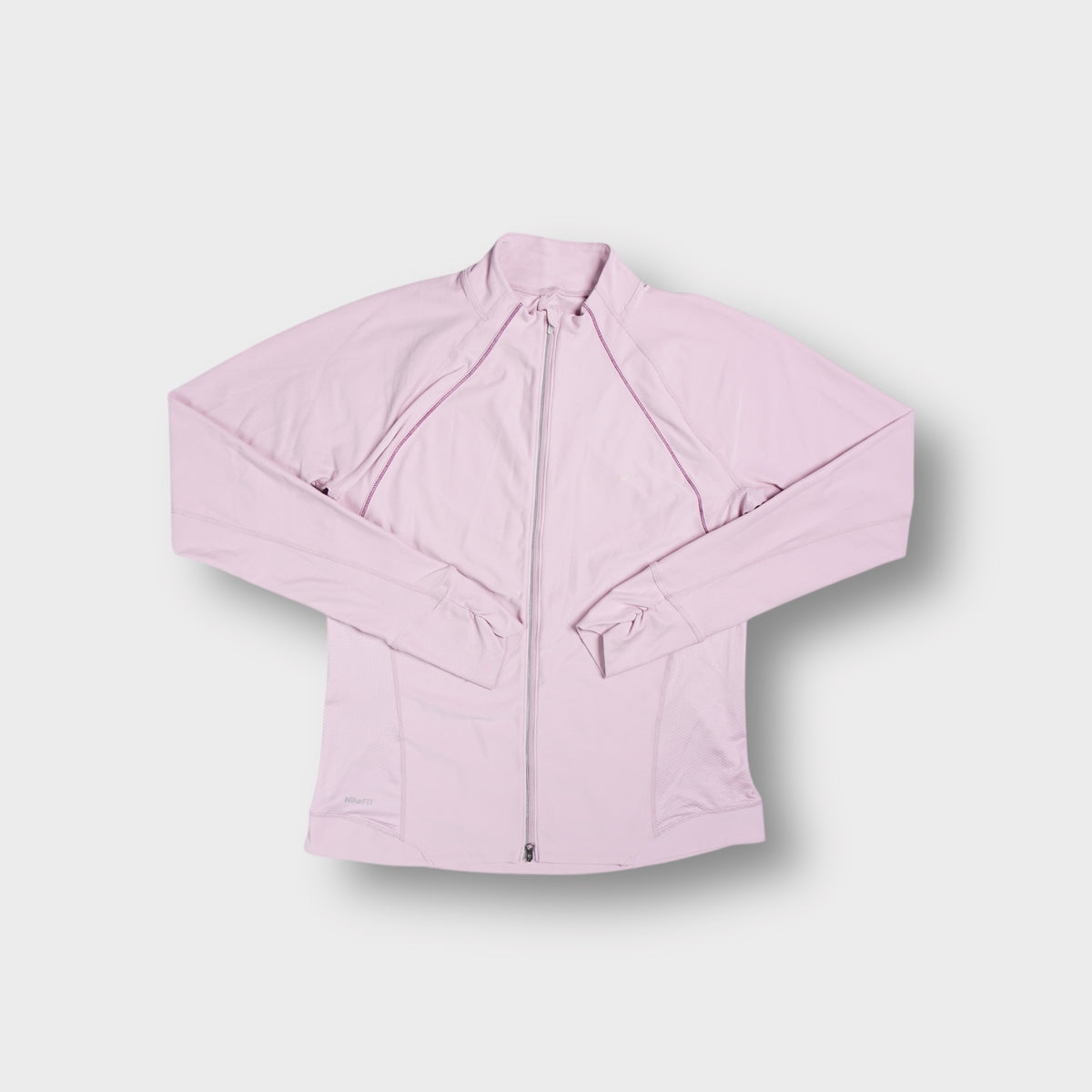 Pink Nike full-zip track jacket with raglan seam stitching and high collar