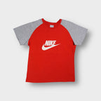 Red Nike T-Shirt with grey raglan sleeves and white swoosh chest logo
