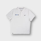 White Nike polo shirt with DN.Galan Youth embroidery and small black swoosh logo.