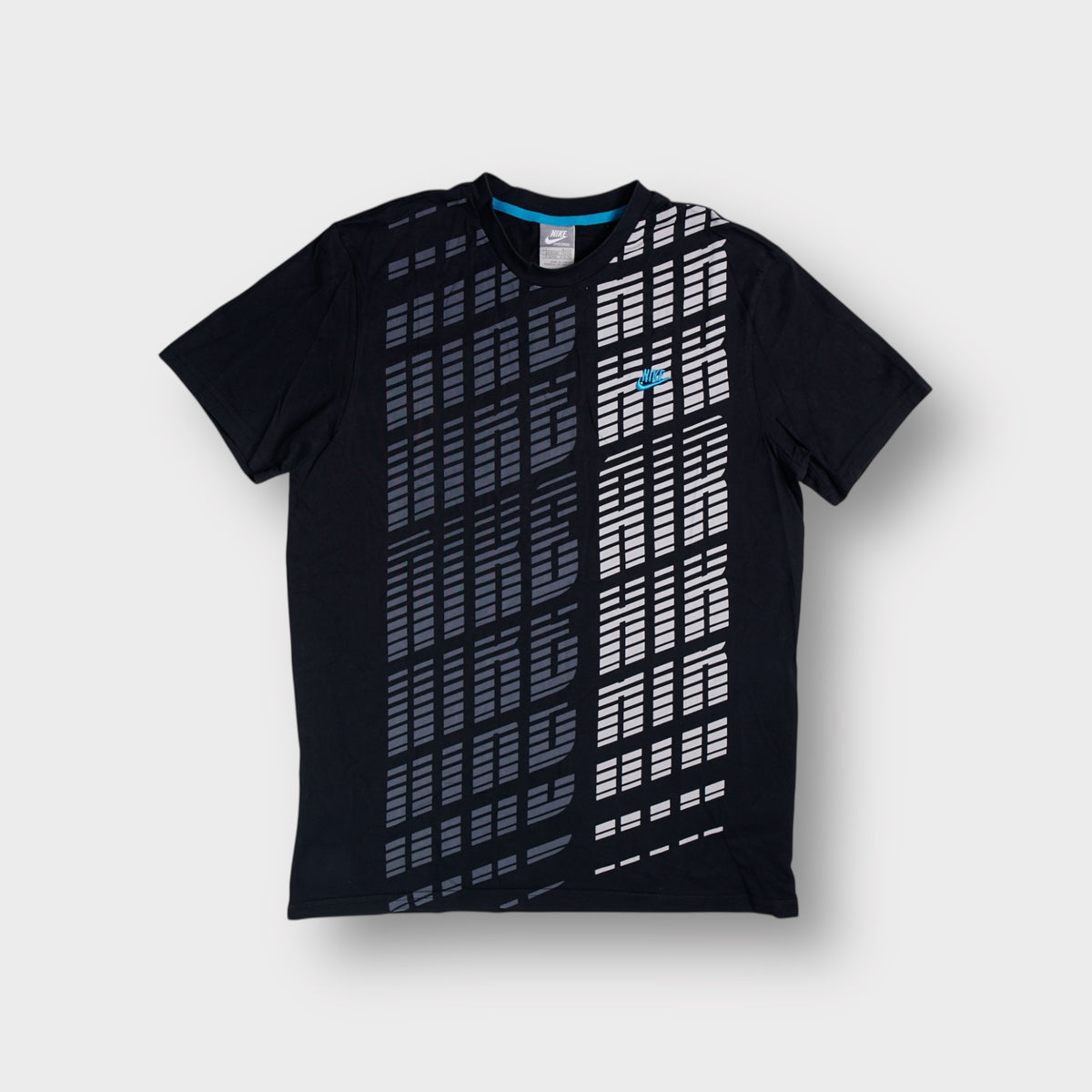 Black Nike T-Shirt with geometric graphic print and small embroidered chest logo