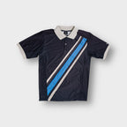Black Nike polo shirt with diagonal blue and white stripes and a light collar.