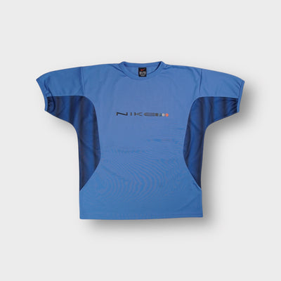 Nike short-sleeve shirt in blue with printed chest typography and dark side panels.